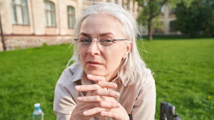 Middle aged woman staring at the camera