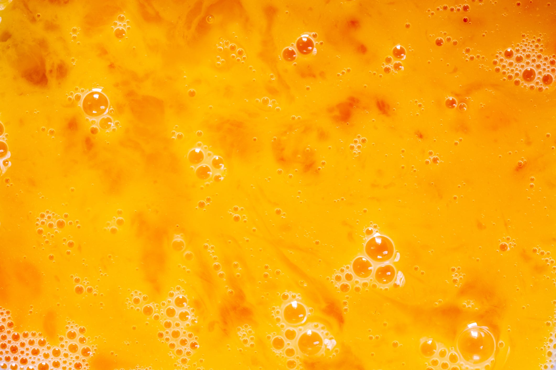Yolk texture,Egg yolks close-up. Background from egg yolks.