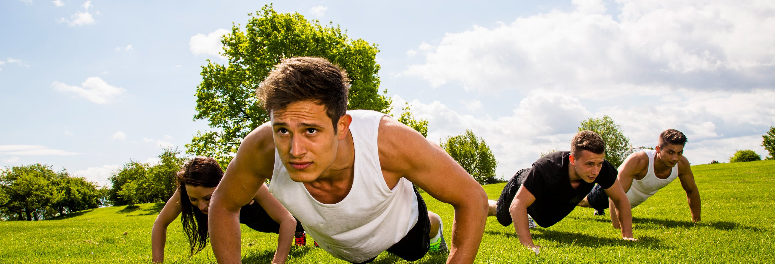 people exercising in park