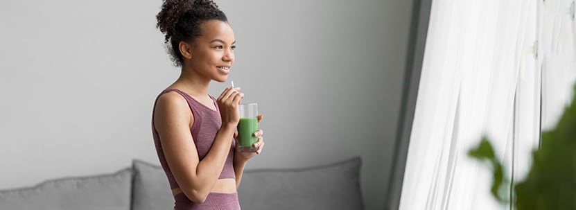 Woman drinking healthy smoothie