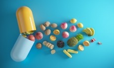 An illustration of a capsule containing nutrients from various fruits.  ©Getty Images 