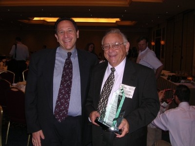 Bob Ullman (right) with his son, Marc (left) in 2005