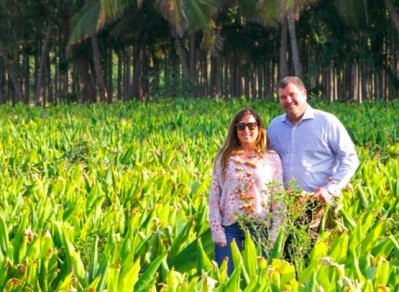 Youtheory founders Darren and Patty Rude in a turmeric field.  Turmeric was one of the first ingredients the brand expanded into beyond its collagen base.  Youtheory photo