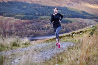 Woman running up a hill in the wilderness. Image © Plume Creative / Getty Images