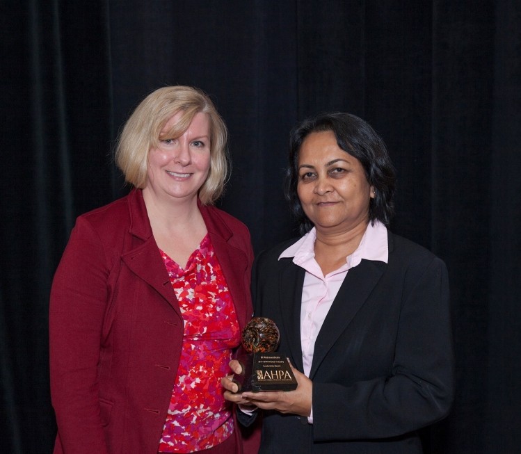 Rupa Das, BI's Vice President of Global Quality and Compliance (right) accepts the AHPA award from Brenda Van Goethm, Nature's Way and member of the AHPA Board of Trustees 