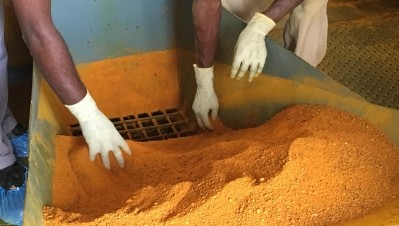 Turmeric/curcumin was once again a leading seller in both natural and mainstream channels.  Here workers at a Sabinsa Corp. plant in India prepare raw material for extraction.  NutraIngredients-USA photo. 
