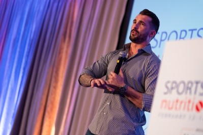 Joel Freeman, BODi super trainer, delivers the keynote speech at 2024 Sports and Active Nutrition Summit in San Diego on Feb. 12 © Photo by Justin Howe