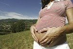The US Public Health Service recommends that all women of childbearing age consume at least 400 micrograms daily of folic acid, beginning before pregnancy.  
